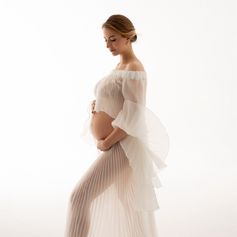 Geplooide zwangerschapsfotogra - Maternity Wear recensie en prijs